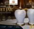Premium white decorative buffet jars with artistic hand-handle design and metallic accents, ideal for hotel buffet displays, catering setups, wedding decorations, and luxury event styling.